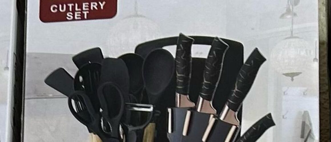20-piece classic cutlery set. Knives, Scissors, and Kitchen Utensils with a black holder.