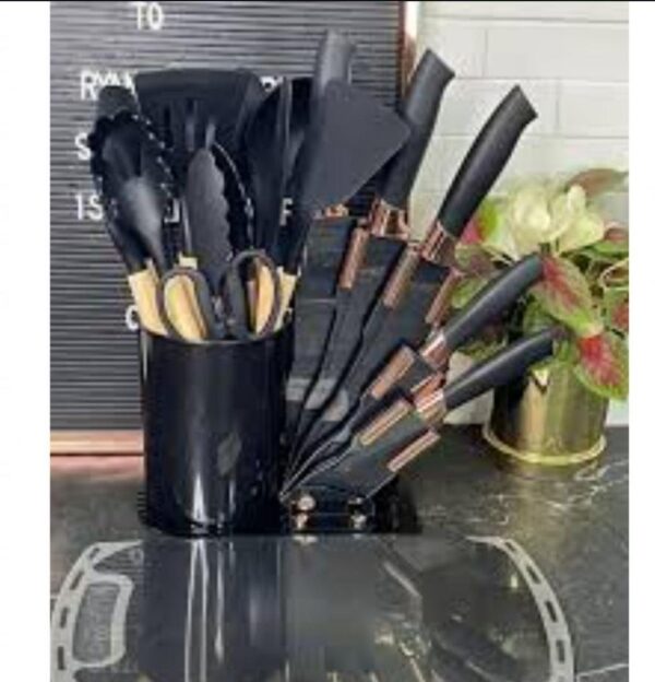 20-piece classic cutlery set. Knives, Scissors, and Kitchen Utensils with a black holder.