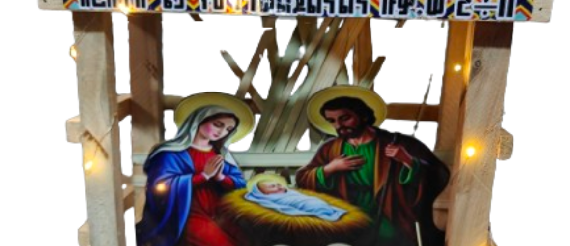 Wooden Nativity House with light.